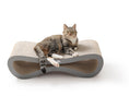 Load image into Gallery viewer, Tabby cat lying on the Nookaroo Agatha Infinity lounge scratcher, three-quarter view