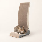 View image 6: Tabby cat resting against the base of the Nookaroo Bennu scratcher on a warm cream background