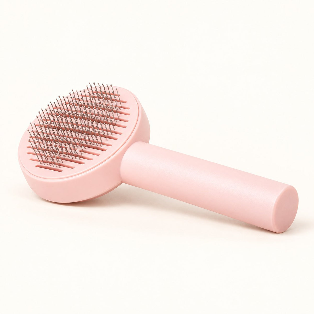Single pink Daily Groom self-cleaning cat brush