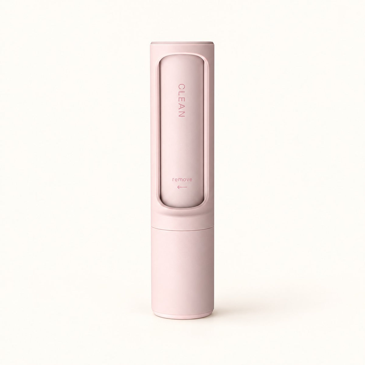 Everyday Pet Hair Remover in pink on a warm ivory background
