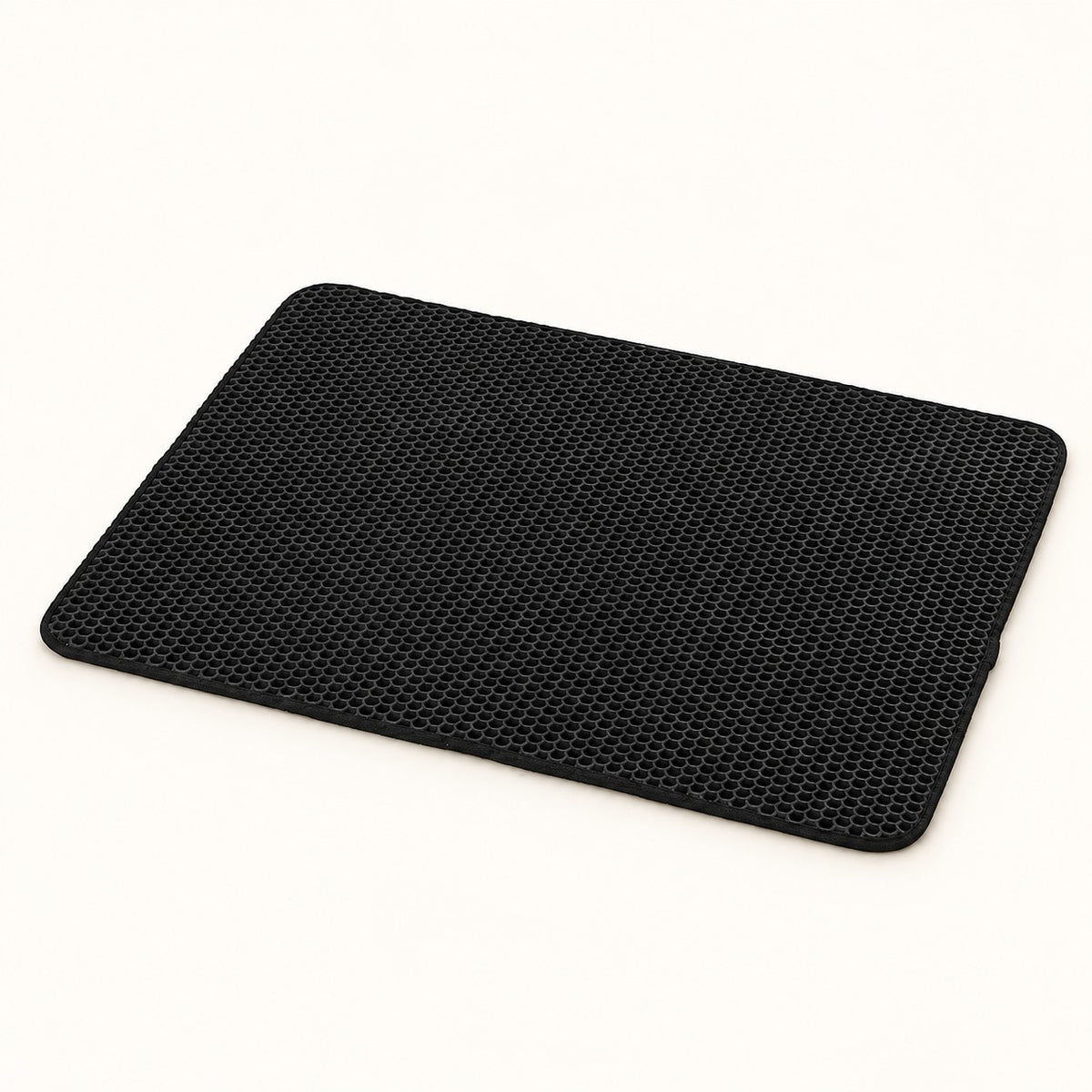 Tidy Paws Double-Layer Litter Mat in black on a warm ivory background; color reference, choose dimensions separately