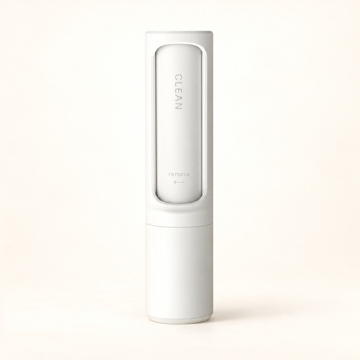 White reusable pet hair remover in its self-cleaning case on a warm ivory background